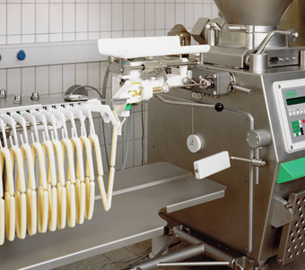 Machine à remplir les saucisses utilisant un va et vient